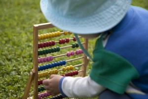 Little kid with abacus